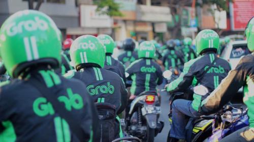 Siap Saingi Go-Jek, Grab Akuisisi Bisnis Uber di Asia Tenggara